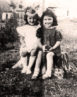 This photo of Nusia (white dress) and her cousin Hanna was taken by Roman Gdanski, probably in the summer of 1940. It is not known where the photo was taken.